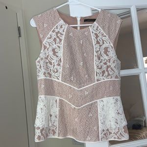 BCBCMAXAZRIA beautiful nude and white lace sleeveless blouse with subtle peplum